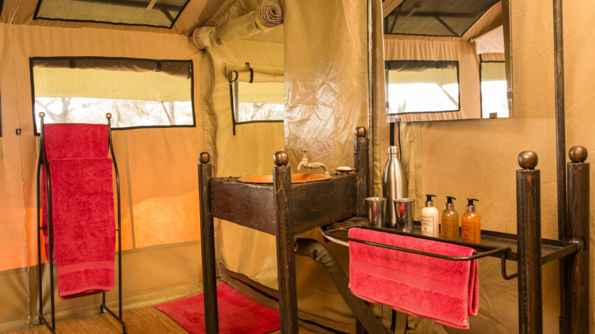 A bathroom sink and amenities.