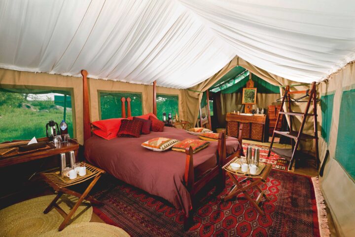 A bedroom in a tent.